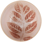 Pressed leaf botanical design in terracotta and cream tones on a round resin coaster or decorative plate.