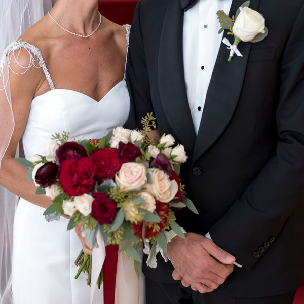 Bridal bouquet with red and blush roses by The Flower Bar, Larchmont NY
