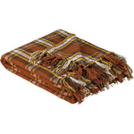 Burnt orange and gold woven throw blanket with decorative fringe detailing, folded and displayed against a white background.