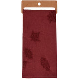 Burgundy tissue wrap with embossed maple leaf pattern displayed on kraft paper backing.