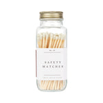 Glass jar filled with cream-colored safety matches, labeled "No. 40 Safety Matches" with a brass screw-top lid.